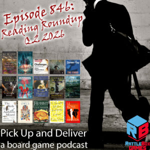 Man walking by a wall of book posters